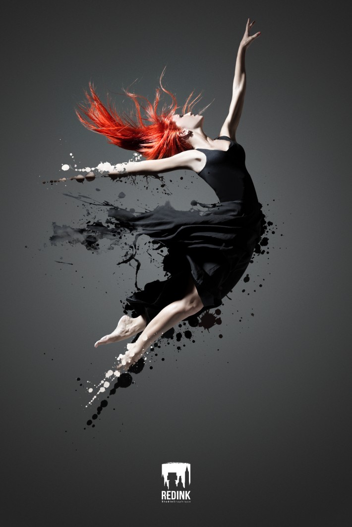 young beautiful dancer posing on a studio background